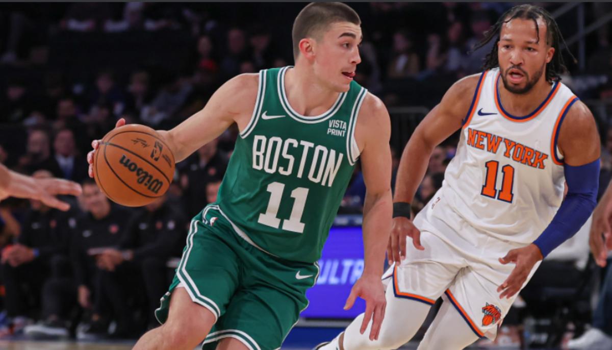 Brunson (in white) played six minutes and scored 10 points in the Knicks' preseason opener